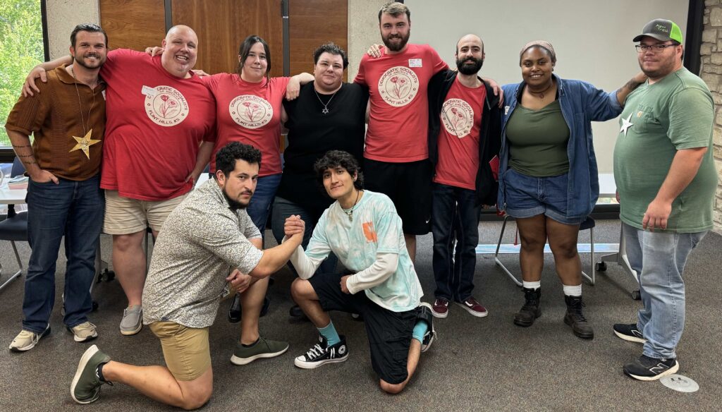 Post-2026 Annual Convention Updates A group of 10 individuals stand together smiling.